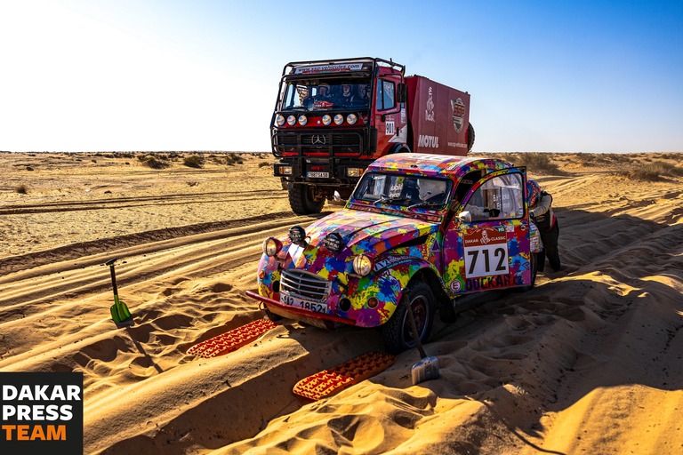 2cv and truck in desert